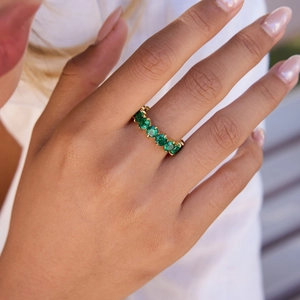 Classic 18K gold stainless steel ring with five green zircon stones in prong setting