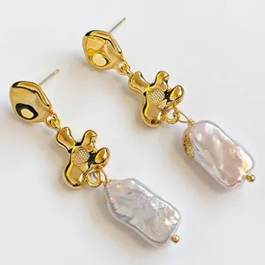 Gold lava baroque pearl earrings with asymmetric tassel drops for luxury women fashion