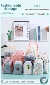 Detail showing various sizes of waterproof drawstring storage bags with cute animal patterns