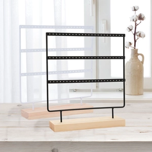 Three-tier iron earring display stand with solid wood base in black and white colors