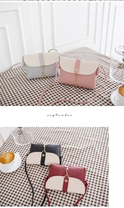 Detail showing four color patchwork mini crossbody bags with gold deer charms in a cafe set