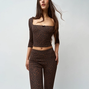 Two-piece leopard print set with long sleeve crop top and high waist leggings