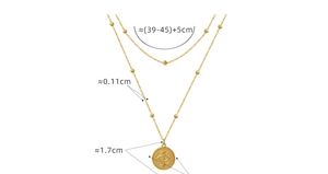Detailed view of evil eye coin pendant on double layered gold titanium steel necklace