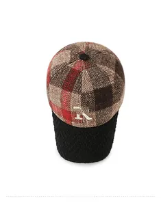 Top view of plaid tweed baseball cap with embroidered letter R and textured black brim