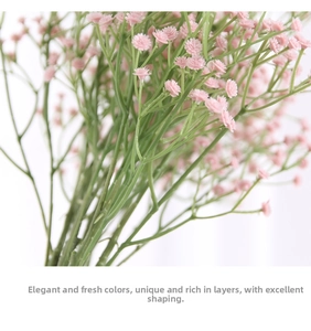 Macro detail of delicate pink baby's breath flowers with realistic green stems
