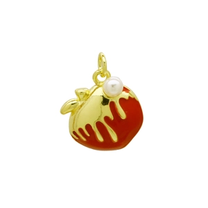 Detail of a golden apple pendant with red enamel, featuring a white pearl and leaf