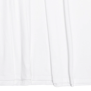 Detail shot of white fabric hem with professional double-stitched sewing and soft texture
