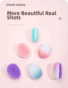 Detail showing smooth matte gradient egg-shaped hairbrush with soft detangling bristles