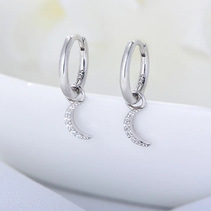 Elegant S925 sterling silver crescent moon earrings with cubic zirconia stones and huggie clasp