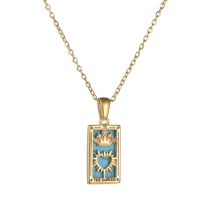 Gold Tarot The Empress necklace featuring turquoise inlay and radiant crown pendant