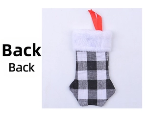 Detail view showing the back of the black and white buffalo plaid Christmas stocking