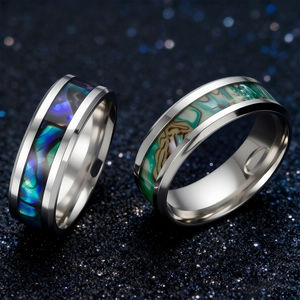 Men's 8mm silver stainless steel rings with iridescent abalone shell inlay on starry background