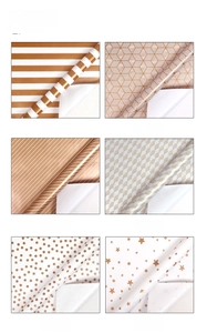 Detailed grid view of six assorted gold foil geometric patterns on premium gift wrap rolls