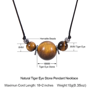 16mm Tiger Eye stone pendant necklace with hematite beads on a 18-inch black cord