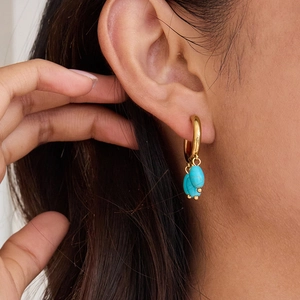 Elegant gold hoop earrings with blue turquoise beads for women in stainless steel