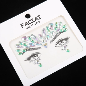 Detail of AB iridescent face rhinestones in teardrop and round shapes on display card