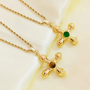 Vintage cross necklaces with emerald and tiger eye stones on gold plated ropes