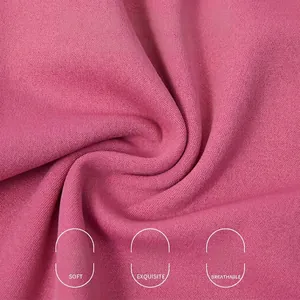 Cross waist flared yoga pants in dusty rose soft, breathable and knit fabric