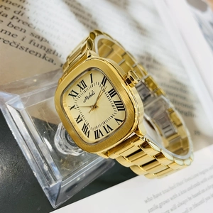 Elegant women's gold rectangular quartz watch with Roman numerals and metal link strap