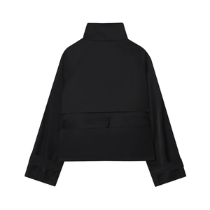 Rear view of a chic black double-breasted trench coat for women with a sleek matte finish