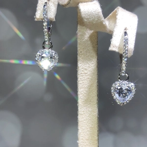 Elegant heart-shaped zircon drop earrings with sparkling halo and silver finish