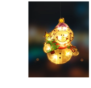 Close-up of a glowing LED snowman hanging light with colorful Christmas holiday decorations