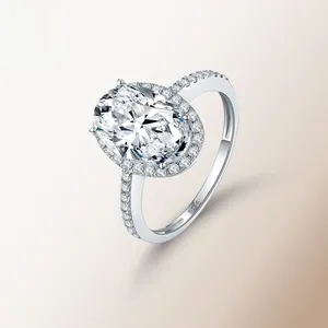 Macro detail of S925 sterling silver ring with oval cut halo set moissanite stone