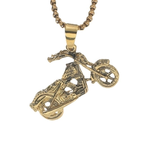 Golden punk motorcycle skull pendant necklace with metal chain on a clean white background
