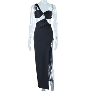 Detail of black one-shoulder maxi dress with side cut-outs and high slit design