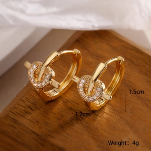 Macro view of 18K gold plated hoop earring with knotted zircon pavé detail and size specs