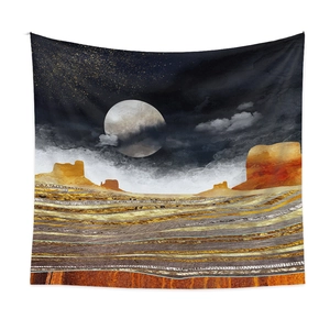 Detailed view of tapestry fabric with abstract surreal moon and desert landscape print