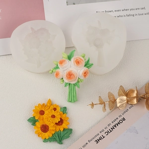 Detail of floral silicone molds showing sunflower and rose texture for DIY crafts