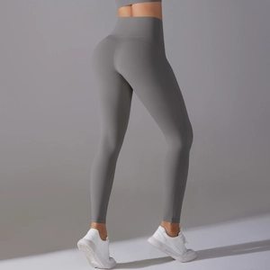 Detail view of high waist seamless yoga leggings in dark grey with high stretch fabric