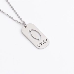 Detailed view of silver titanium steel necklace featuring a hollow Lucky pendant