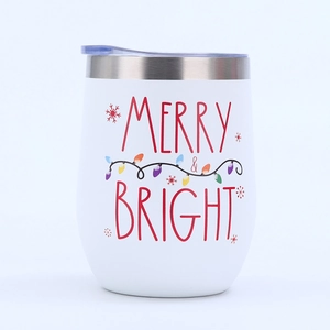 Detail of white 12oz stainless steel wine tumbler with Merry & Bright Christmas print