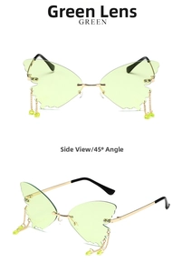 Detail view of butterfly rimless sunglasses with green lenses and gold metal chains