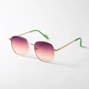 Retro round metal sunglasses with pink gradient lenses and gold frame in 45-degree view