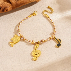 Bohemian musical note and guitar charm bracelet with colorful braided rope chain