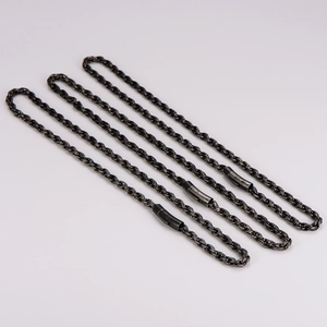 Three vintage stainless steel twisted cable chain necklaces in dark metal finish