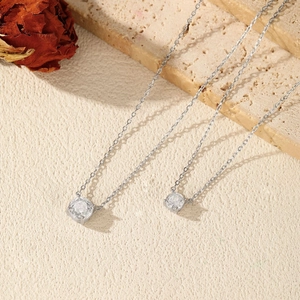 Elegant S925 sterling silver necklaces with rose cut diamond pendants on textured stone