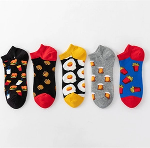 Flat lay of five pairs of cotton ankle socks with colorful food and drink patterns