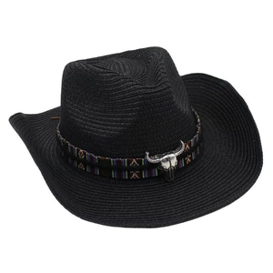 Close-up of black straw cowboy hat featuring ethnic band and silver longhorn skull detail