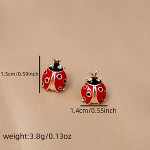 Dimensions détaillées des boucles d'oreilles coccinelle rouge et noir dorées