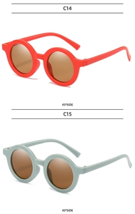 Detailed 45-degree side view of matte round frame sunglasses for toddlers in red and grey