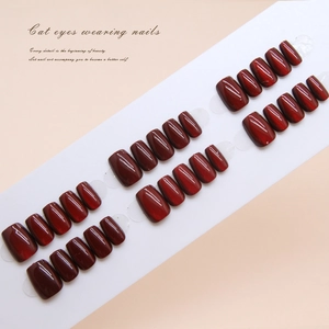 Short T cherry red cat eye press-on nail kit set with 24 pieces on display card