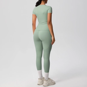 Detail showing back view of light green yoga set with high waist compression leggings