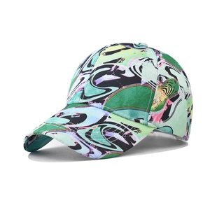 Close-up of geometric gradient baseball cap featuring abstract fluid marble patterns