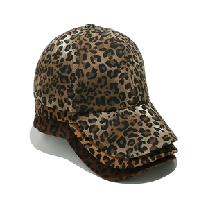 Three stacked leopard print baseball caps for women with trendy brown animal patterns