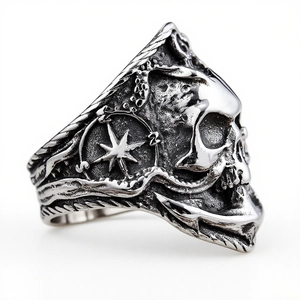 Detailed close-up of nautical skull ring featuring anchor and compass engraving details