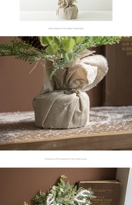 Close-up of artificial Christmas plant with burlap base for festive table decoration